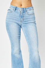 Judy Blue Full Size Mid Rise Raw Hem Slit Flare Jeans - Luxe Shopping