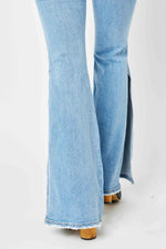 Judy Blue Full Size Mid Rise Raw Hem Slit Flare Jeans - Luxe Shopping